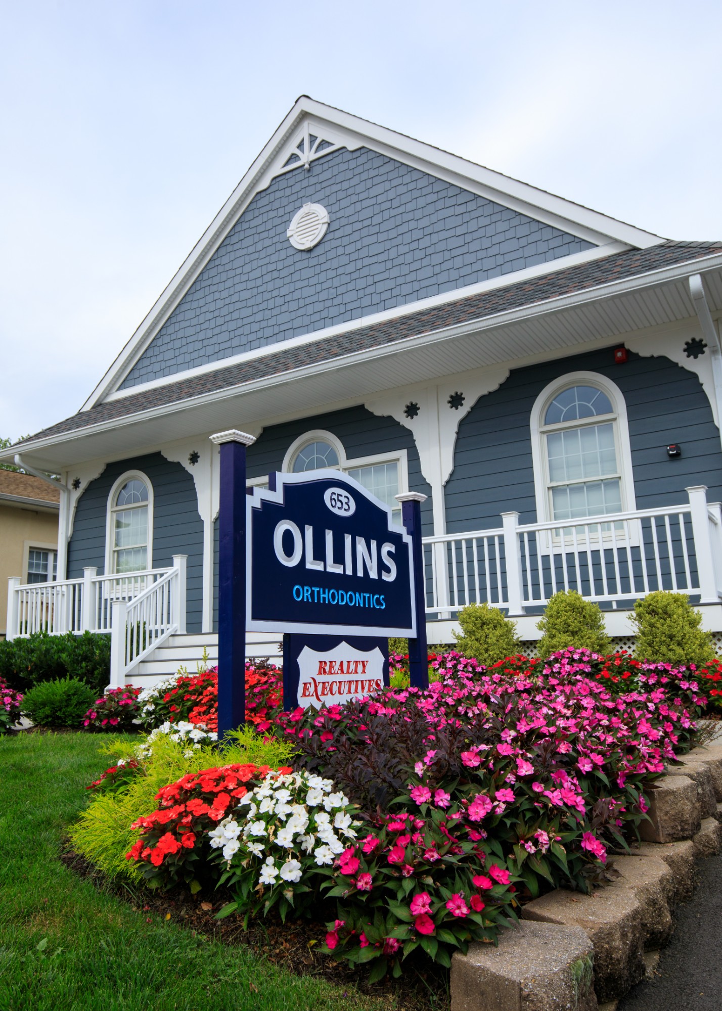 front of office with sign